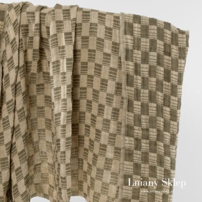 Prany len w zielone i żółtawe okienka.