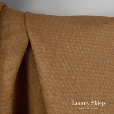 Brązowy len w drobny wzorek.