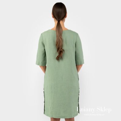 Jasna zielona sukienka widok z tyłu.