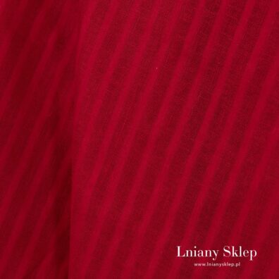 Czerwony len w ażurowe paski.