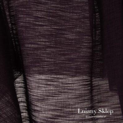 Ciemna fioletowa prześwitująca tkanina.