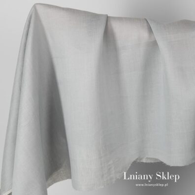 Tkanina lniana lekko szara we wzorek.