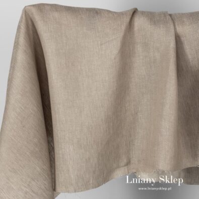 Tkanina lniana piaskowa we wzorek.