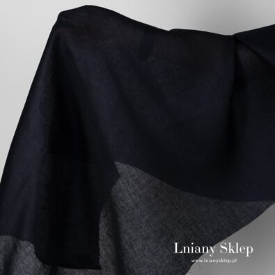 Tkanina lniana granatowa we wzorek.