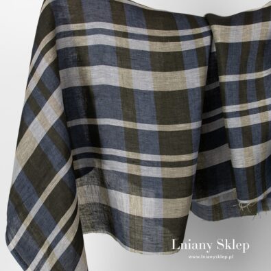 Tkanina lniana w czarną i zielonkawą kratkę.