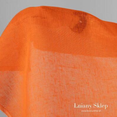 Przeźroczysta pomarańczowa tkanina lniana.