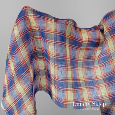 Przeźroczysta tkanina w niebieską i pomarańczową kratkę.