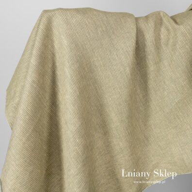Jasna żółtawa tkanina lniana splot waflowy.