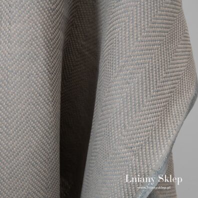 Szara tkanina wytkana w jodełkę.