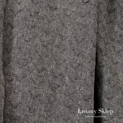 Prana tkanina lniana w geometryczny wzorek.