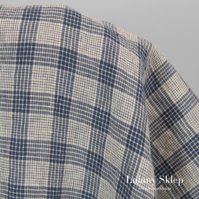 Żółtawy w granatową kratkę len.