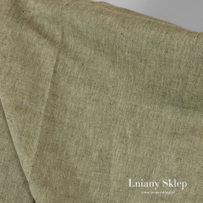Tkanina zielona, lniano - bawełniana.
