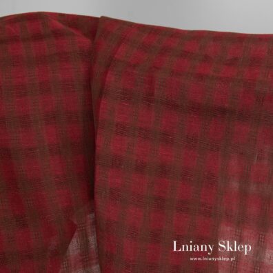 Czerwono - brązowy len w przeźroczystą kratkę.
