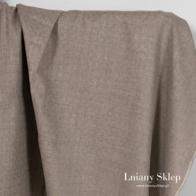 Niebarwiona lniana w ażurową kratkę tkanina.