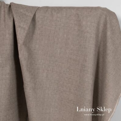 Niebarwiona lniana w ażurową kratkę tkanina.