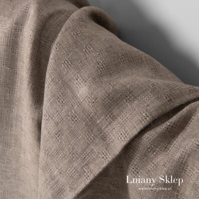 Tkanina lniana w przeźroczystą krateczkę.