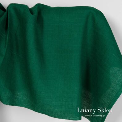 Zielona lniana w białe prążki tkanina.