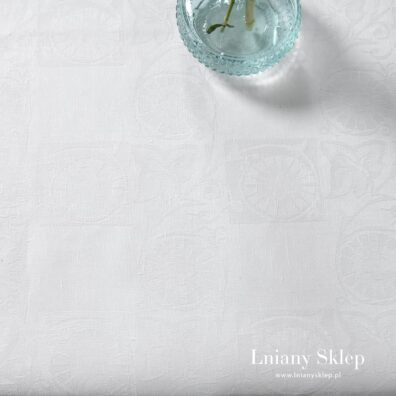 Śnieżnobiały żakardowy obrus kwadratowy lub prostokątny.