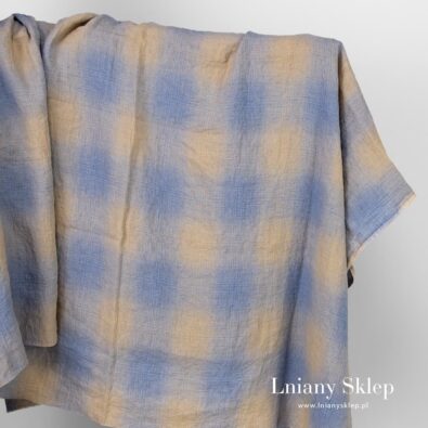 Len prany w niebieską i piaskową kratkę.