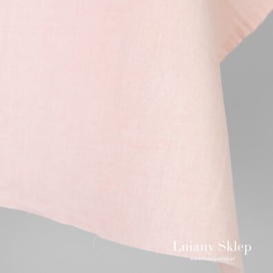 Jasnoróżowa tkanina lniano-bawełniana.