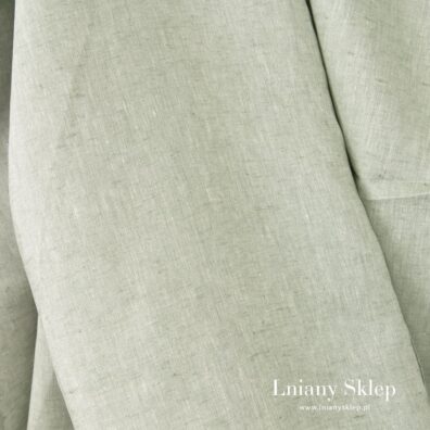 Tkanina lniana w zielono - białym melanżu.