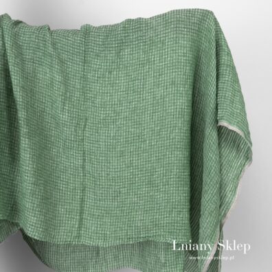 Zielony prany len w prześwitującą kratkę.