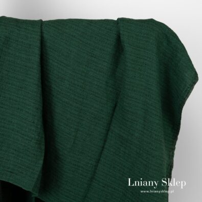 Zielono-czarny prany len we wzorek.