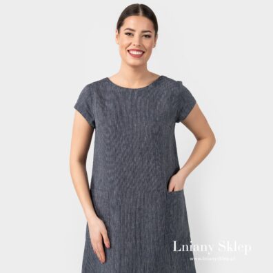 Zaokrąglony dekolt. Kształt - tapez.