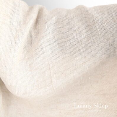 Piaskowy prany len w drobne wzorki.