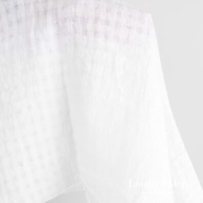 Śnieżnobiały prany len 100%.