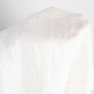 Biały mięciutki prany len w pionowe paski.