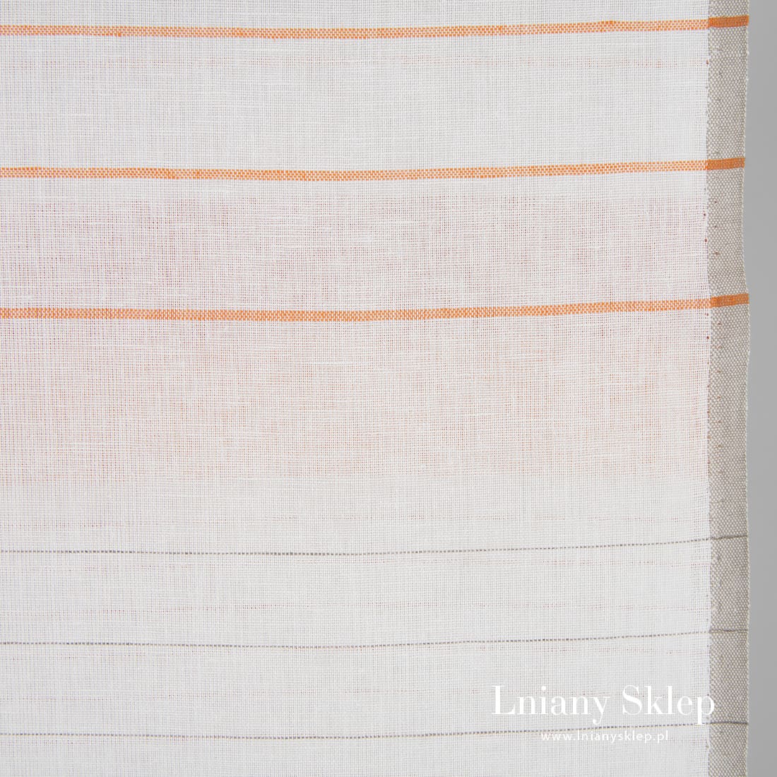 Mlecznobiała w paski tkanina ścierkowa.