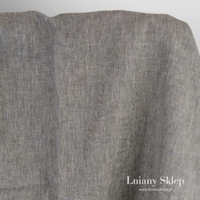 Tkanina lniana w melanżu czarnym i żółtym.