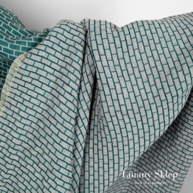 Dwustronna zielono - szara prana tkanina.