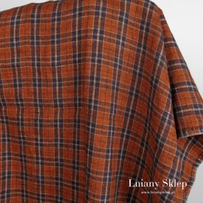 Pomarańczowa w kratkę prana tkanina len z wełną.