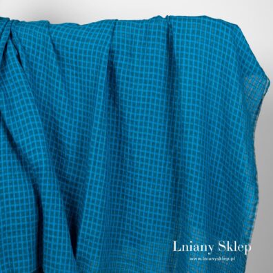 Prany len w przeźroczystą krateczkę turkusową i niebieską.