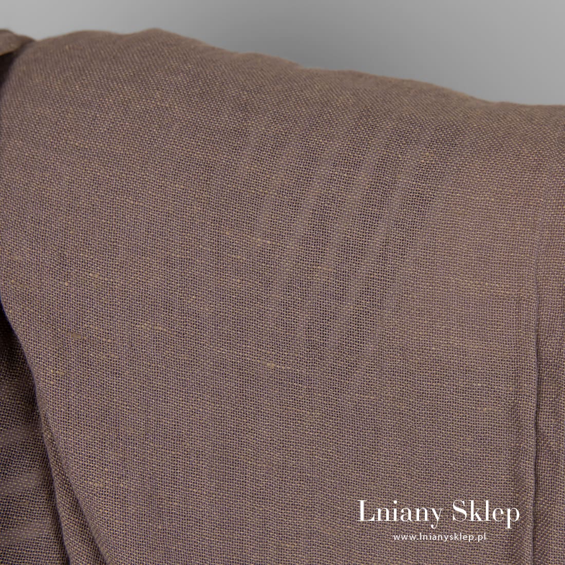 Fioletowa w szarość tkanina lniano - bawełniana.