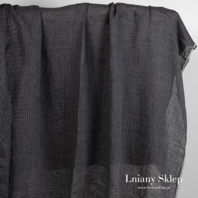 Ciemny len prany w prześwitującą kratkę.