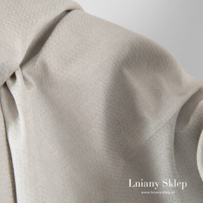 Tkanina z białej i szarej w niebieskość przędzy.