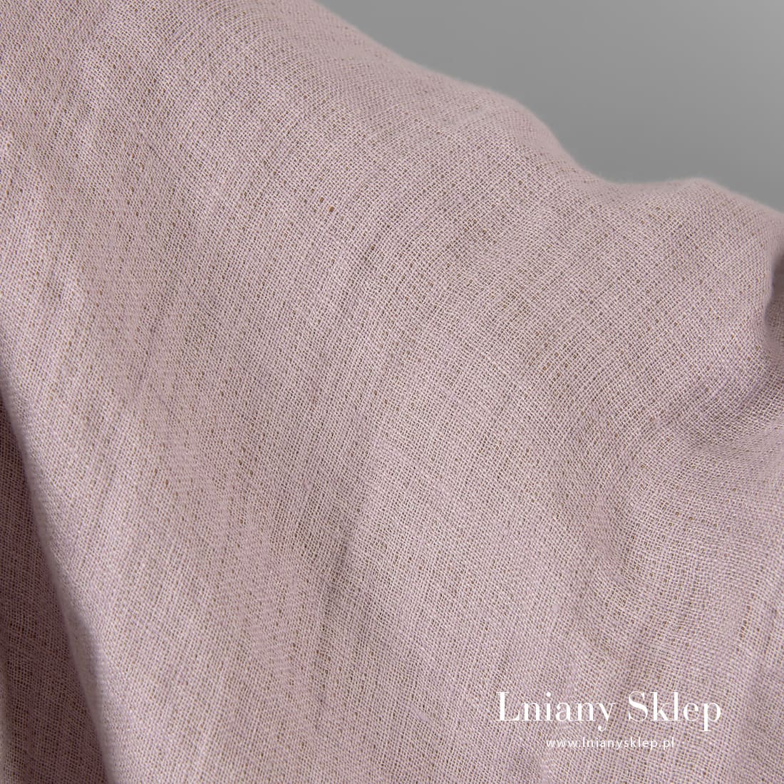 Liliowa strona tkaniny dwustronnej.