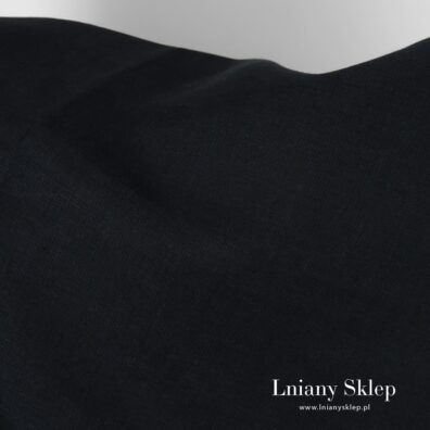 Granatowy len w lekkie, ledwo widoczne, biegnące wzdłuż tkaniny prązki.