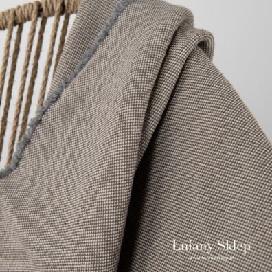 Szary w rzucik lniano - bawełniany pled.