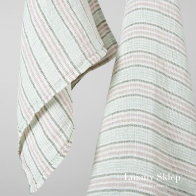 Jasny zielony ręcznik waflowy.