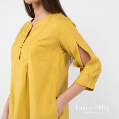 Kieszenia na bokach.