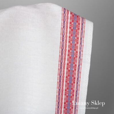 Biała, ozdobnie wytkana po brzegach tkanina na szycie bluzek, fartuchów, obrusów.