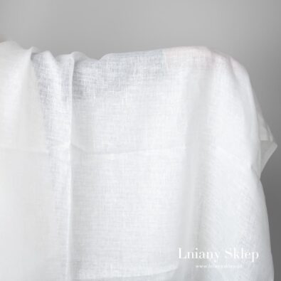Śnieżnobiała lekka tkanina lniana.