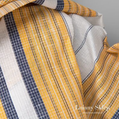 Lniano - bawełniana tkanina waflowa wytkana w pionowe paski.