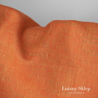 Tkanina z przędzy piaskowej w żółty i czerwonej.