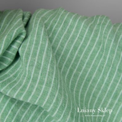 Szeroki zielony len prany na zasłony, obrusy, pościel, odzież.