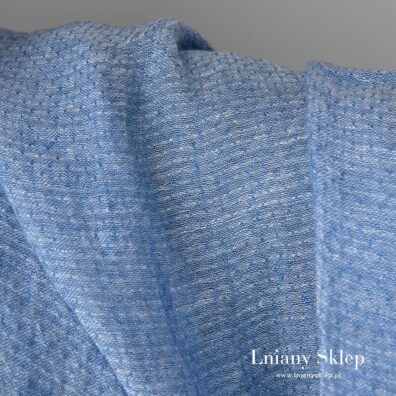 Niebieski dekatyzowany len z białej i niebieskiej przędzy.